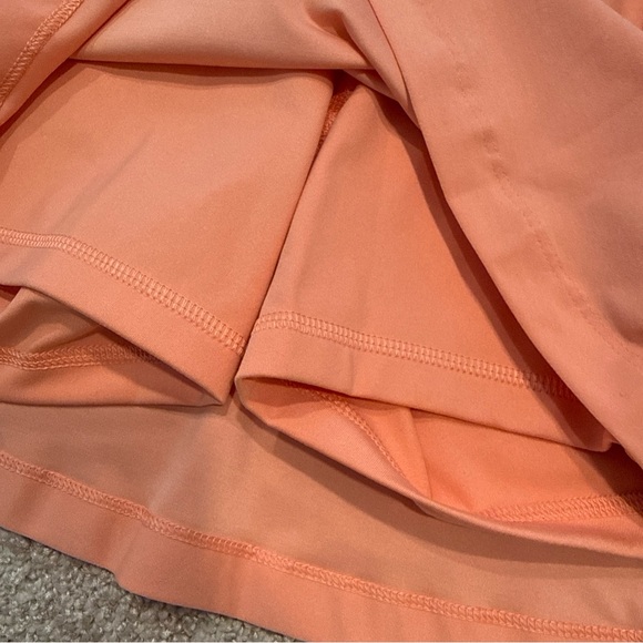 Women’s Nike Golf Skort Orange Salmon fz6314-844 - Picture 6 of 7